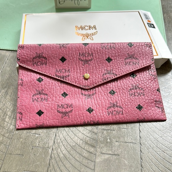 MCM Handbags - MCM Pink Clutch with Black Accents
